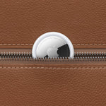 AirTag attached inside a leather bag