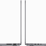 Two closed MacBook Pro 14-inch units seen edge-on, showing the thin profile